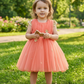 Girls peach casual frock m250064