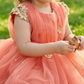 Girls peach casual frock m250064