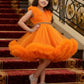 Girls orange knee length Party frock m240013