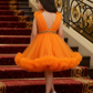 Girls orange knee length Party frock m240013