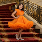 Girls orange knee length Party frock m240013